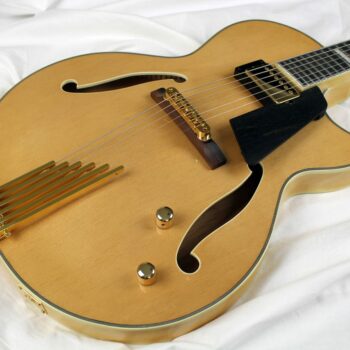 Natural Blonde jazz guitar with gold finger tailpiece